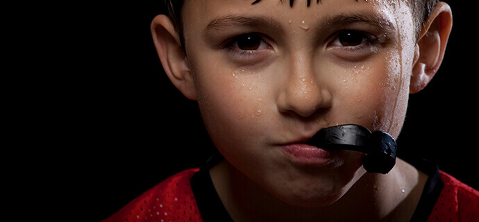 young boy with mouthguard