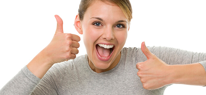woman doing double thumbs up